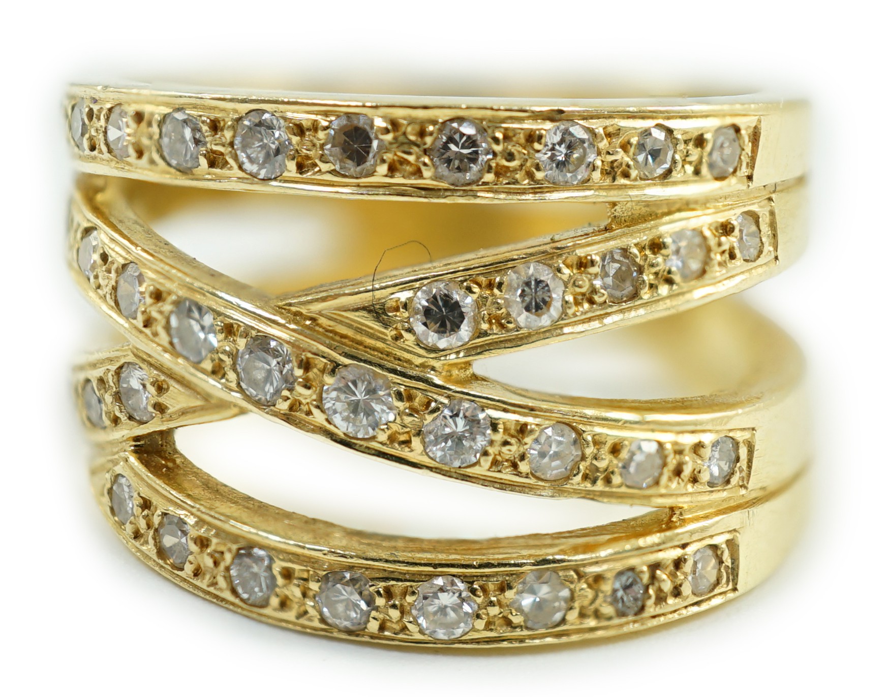 A modern 750 and diamond chip cluster set multi shank dress ring, size P, gross 10.1 grams.